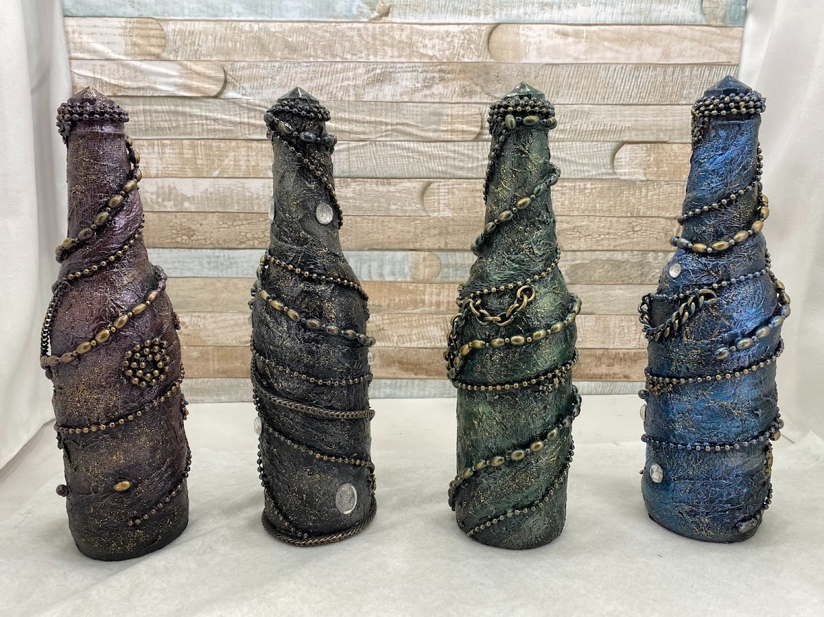 STEAMPUNK GLASS BOTTLES X4 – ANY OCCASION OR SPACE – RED/GREEN/SILVER/BLUE
