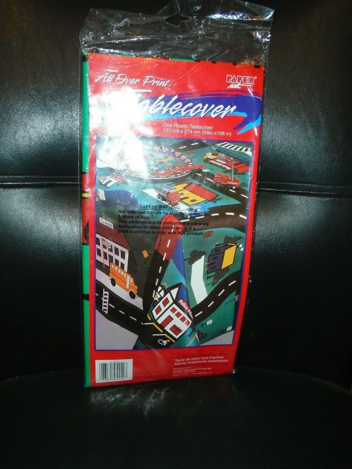 NOS PAPER ART PLASTIC TABLECOVER ALL OVER PRINT CARS & TRUCKS 54″ X 108″