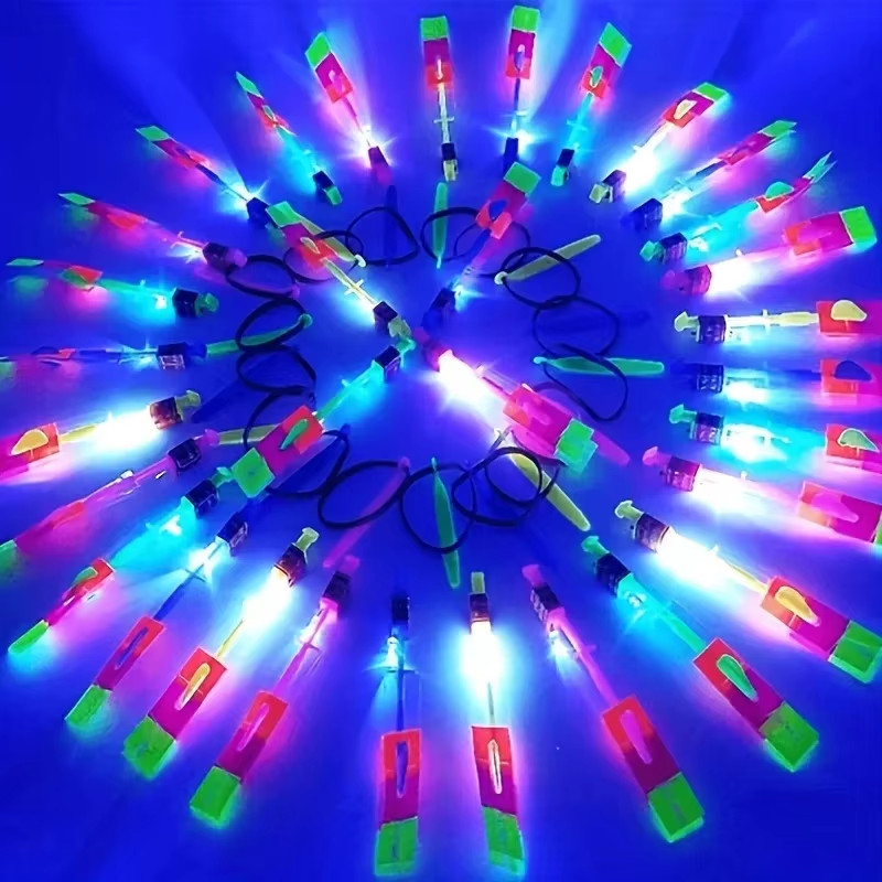 10Pcs LED Light Rockets Flying Toys Slingshot Launcher Birthday Halloween Christ