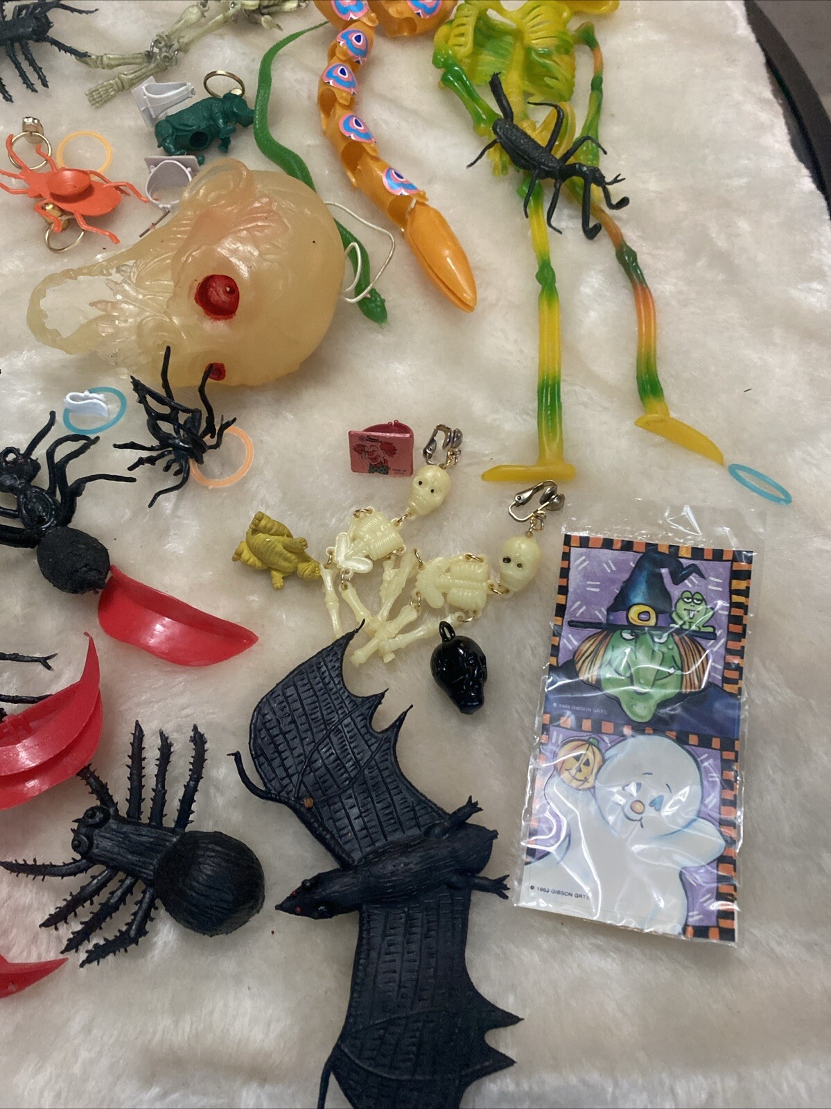 Halloween Toy Trinket Lot Skeletons Bats Spiders Pez Skull
