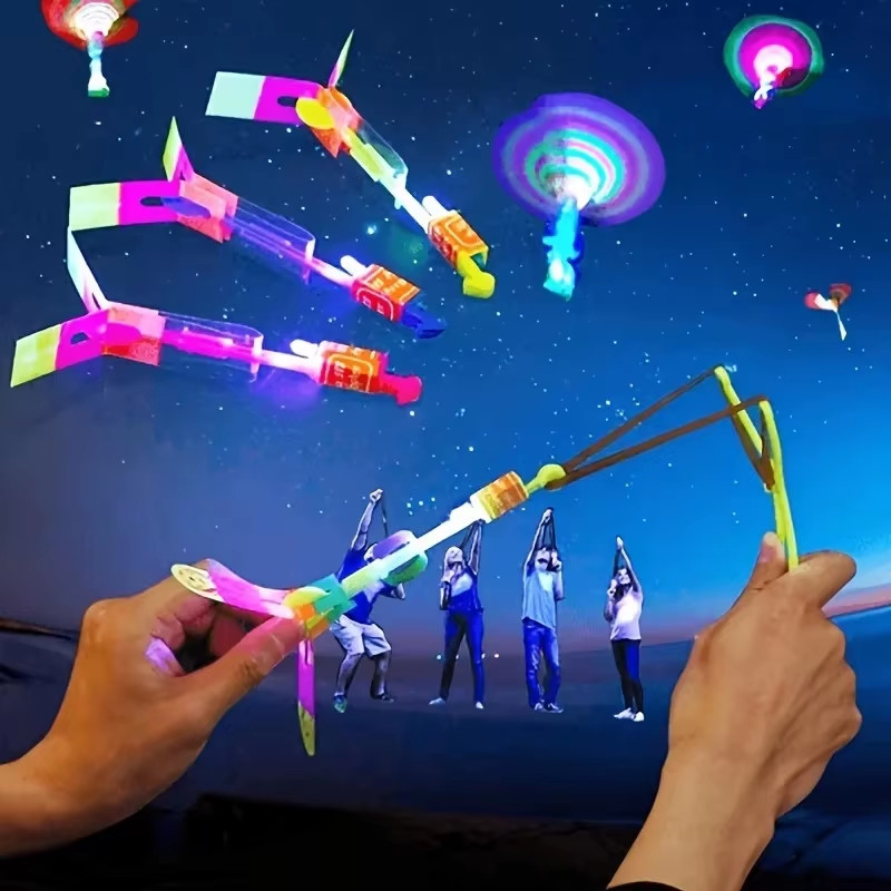 10Pcs LED Light Rockets Flying Toys Slingshot Launcher Birthday Halloween Christ